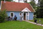 Anker, Kaj, Gunner og Flemming foran hytten, hvor vi boede i Boeker Mhle, d. 27.05.2004. Bjarne Nielsen